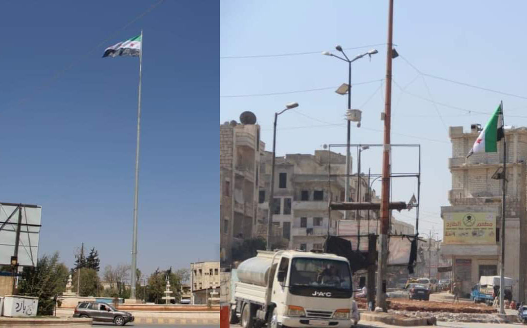 هل استبدلت هيئة تحرير الشام راياتها في إدلب بـ "علم الثورة السورية"؟