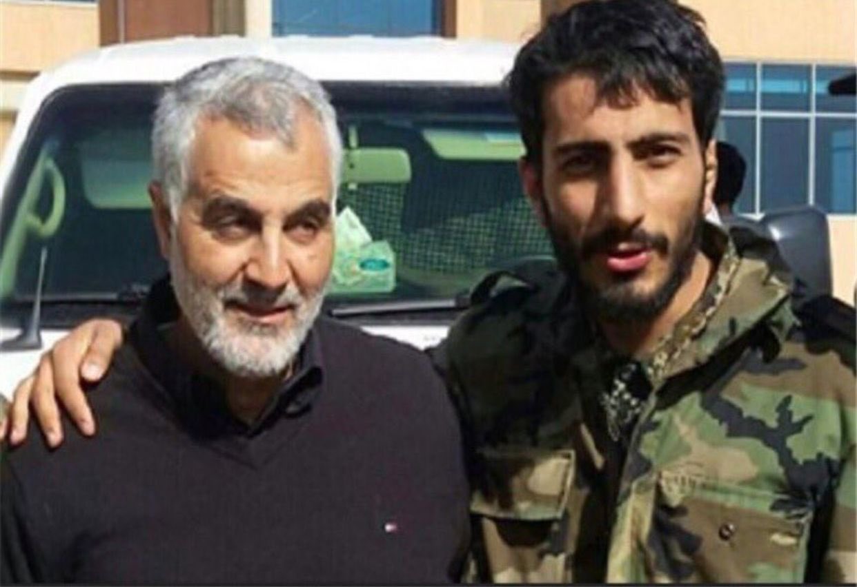 هل تجمع هذه الصورة مرتكب "مجزرة التضامن" مع قاسم سليماني؟