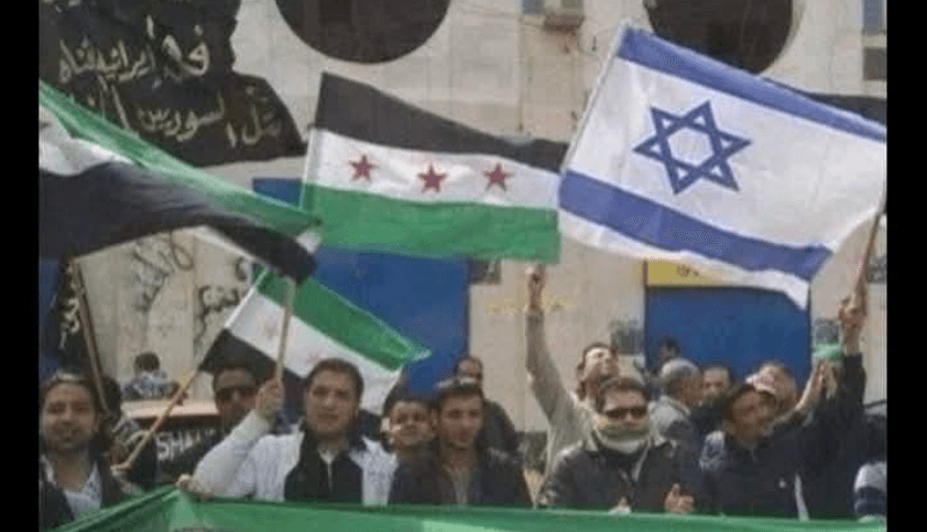 هذه الصورة لا تظهر رفع العلم الإسرائيلي خلال  مظاهرة مؤيدة للثورة السورية